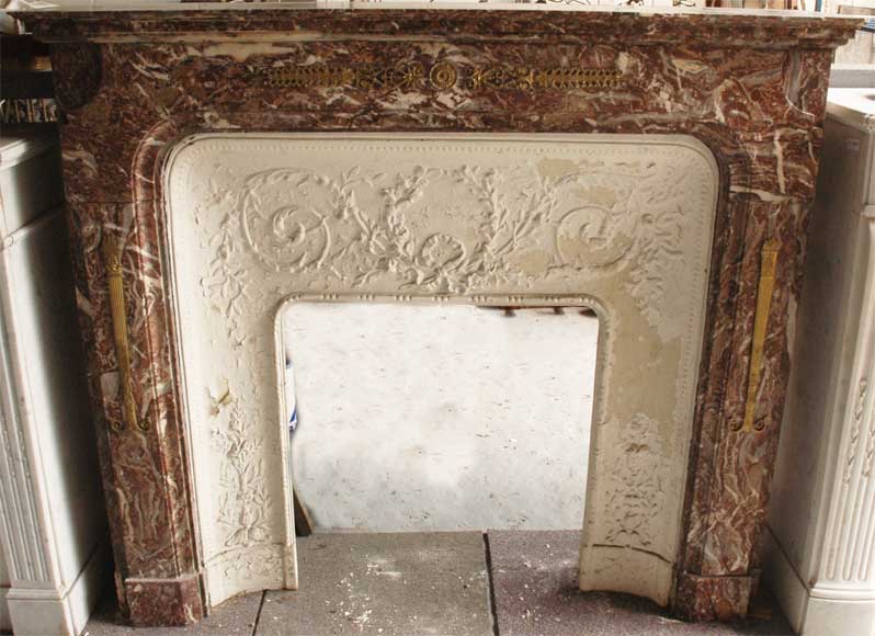 Transition style fireplace with bronze ornaments-0