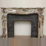 Antique Louis XV style mantel in Fleur de Pêcher marble