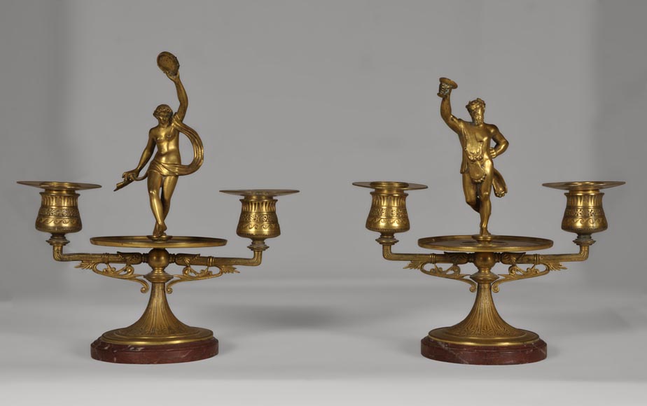 "The Bacchanal", pair of gilded bronze and Red Griotte marble candlesticks-0