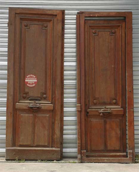A pair of wooden monumental doors. -0