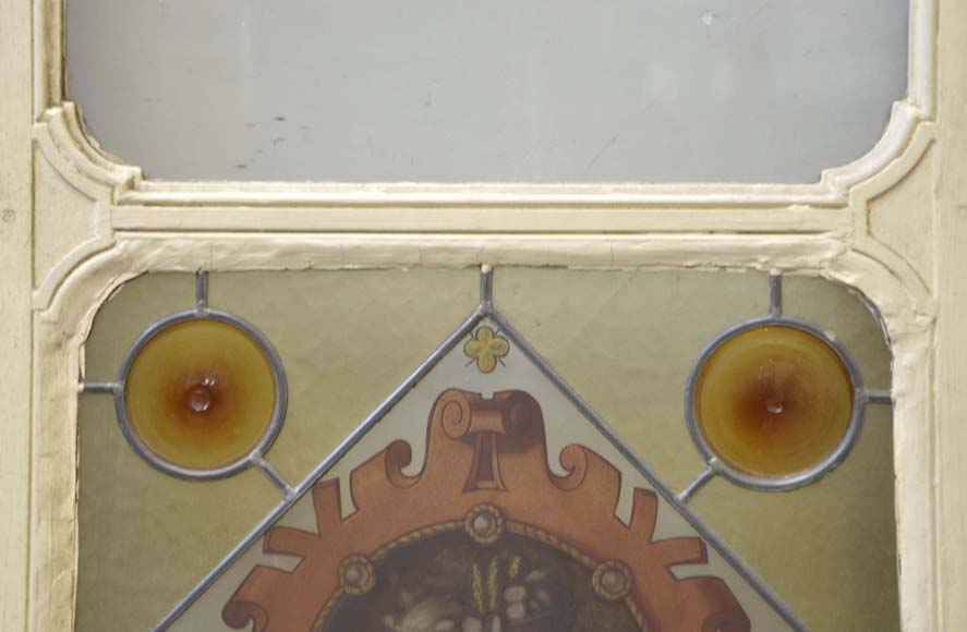 Double door with stained glass windows,  man and woman's profile in medallion-2
