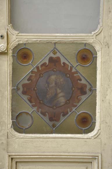 Double door with stained glass windows,  man and woman's profile in medallion-3