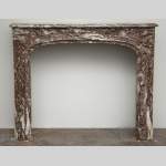 Antique Regence period fireplace made out of Red of Rance marble from the 18th century