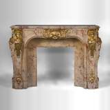 Prestigious antique fireplace in Scagliola as Sarrancolin Fantastico marble made after the fireplace of the Council Room at the Palace of Versailles