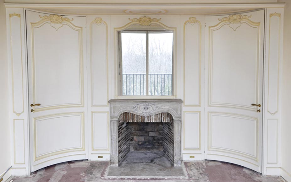 Beautiful Louis XV style paneled room with 18th century stone fireplace-0
