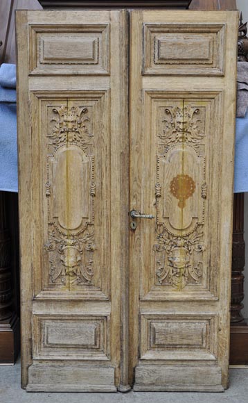 Carved oak wood double door with grotesque decor-0