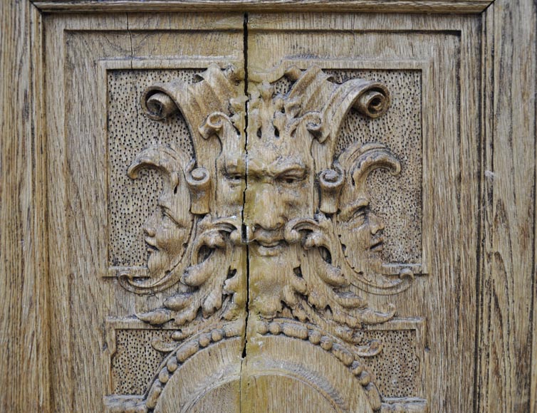 Carved oak wood double door with grotesque decor-1