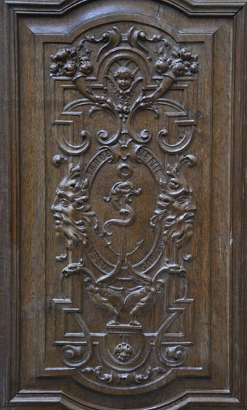 False pair of antique  carved oak doors from the 19th century-1