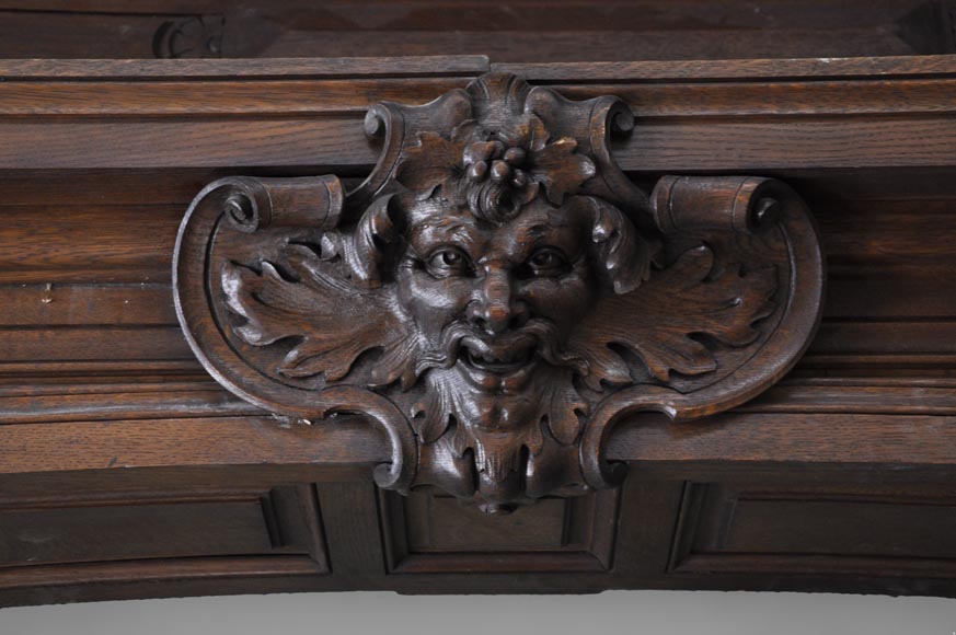 Oak wood paneled room with satyres heads and drapery patterns, 19th century-1