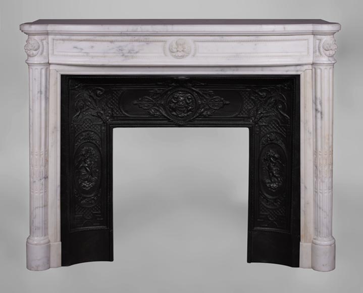 Beautiful antique Louis XVI style fireplace with fluted halfcolumns