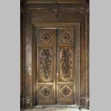 Large antique carved oak wood paneled room with hunting trophies and still lifes decor