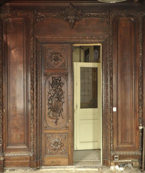 Large antique carved oak wood paneled room with hunting trophies and still lifes decor-1