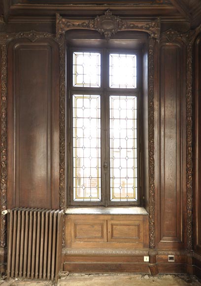 Large antique carved oak wood paneled room with hunting trophies and still lifes decor-2