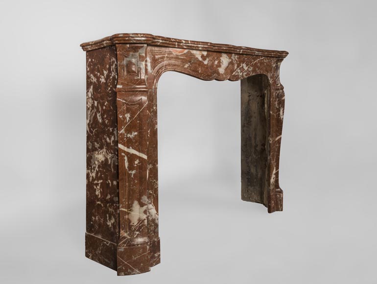 An antique Louis XV style fireplace, Pompadour model, made out of Rouge du Nord marble-3