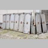 Antique set of eight industrial boiler room doors 