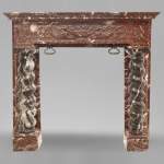 Antique Napoleon III style fireplace with salomonic columns made of Red Marble and Black Marquina Marble