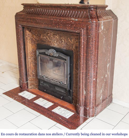 An antique Louis XIV style fireplace, with acroterion and Bollection, made out of Rouge Griotte marble-5