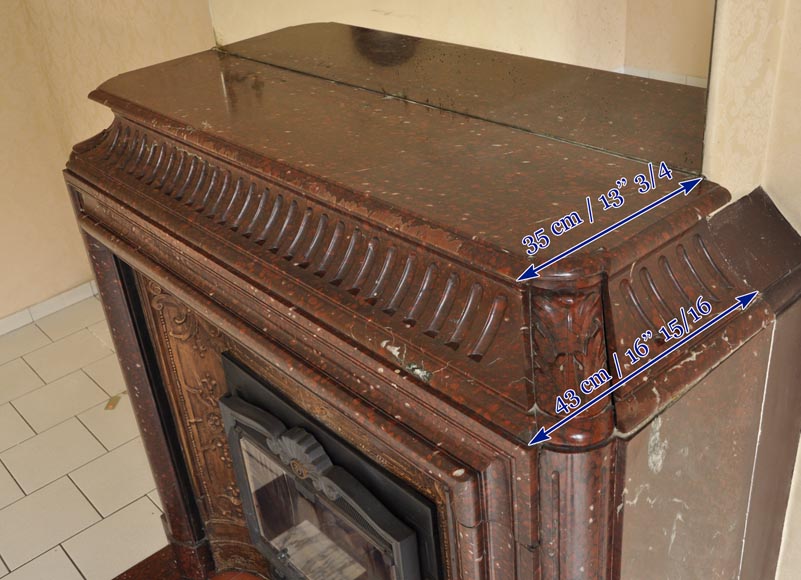 An antique Louis XIV style fireplace, with acroterion and Bollection, made out of Rouge Griotte marble-10