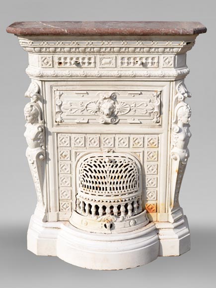 Antique cast iron stove in the Napoleon III style decorated with caryatids-0
