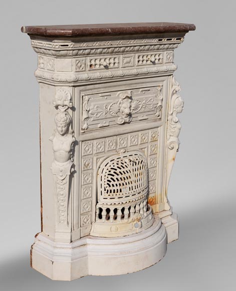 Antique cast iron stove in the Napoleon III style decorated with caryatids-2