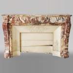 Antique Louis XVI style mantel with rudentures in red Onyx