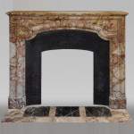 Antique Louis XIV style Bolection mantel in Breche de Montmeyan marble from the end of the 19th century
