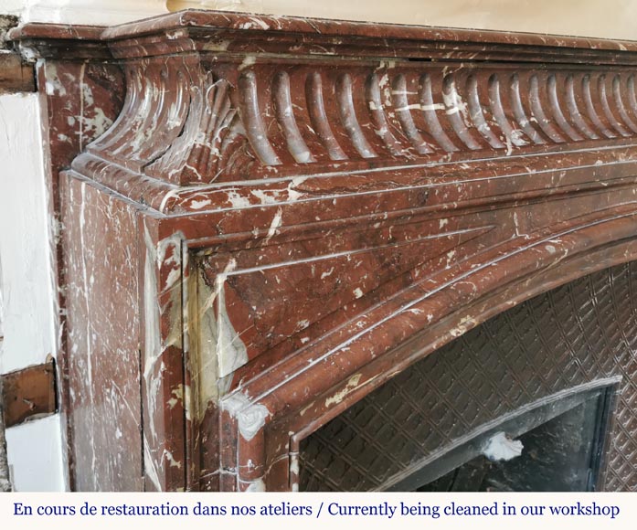 Louis XIV style mantel with an acroterion in Red of the North marble-3
