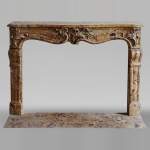 Louis XV period mantel in Alep Breccia with a winged shell