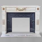 Louis XVI style mantel in semi-statuary Carrara marble with garland of flowers and vine leaves