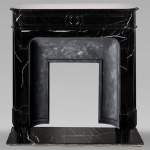 Louis XVI style chimney in Marquina marble with rounded corners