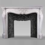 Louis XV style mantel adorned with acanthus leaves in Carrara marble