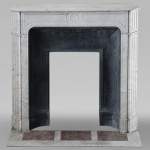 Small Carrara marble mantel with canted jambs and fluted legs