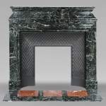 Louis XIV style mantel with sea green marble acroterions