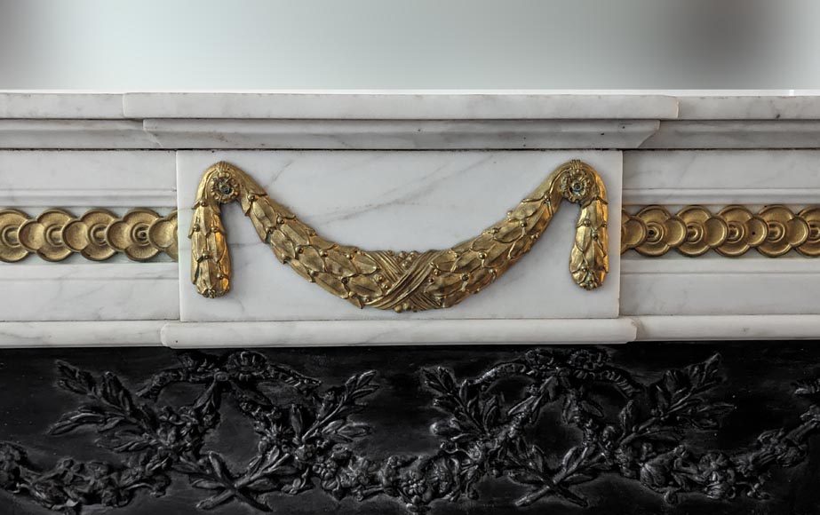 Louis XVI style mantel with garland and frieze of flowers-1