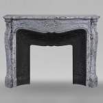 Louis XV style mantel with three carved shells in Bleu Fleuri marble