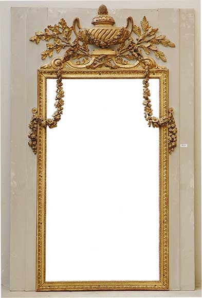Large_mirror_overmantel_with_painted_wood_and_stucco_frame.jpg