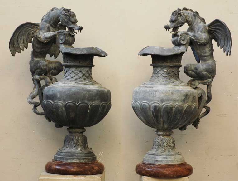 Rare_pair_of_lead_garden_vases_with_dragon_handles.jpg