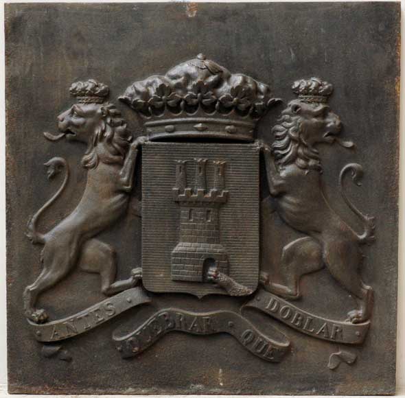 Cast_iron_fireback_with_coat_of_arms_with_a_tower_and_two_lions.jpg
