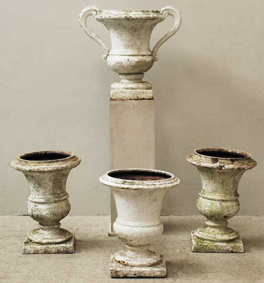 Four_18th_century_cast_iron_garden_vases.jpg