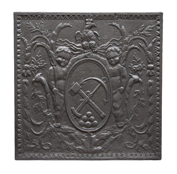 Fireback_with_medallion_of_anchor__axe_and_cannon_balls.jpg