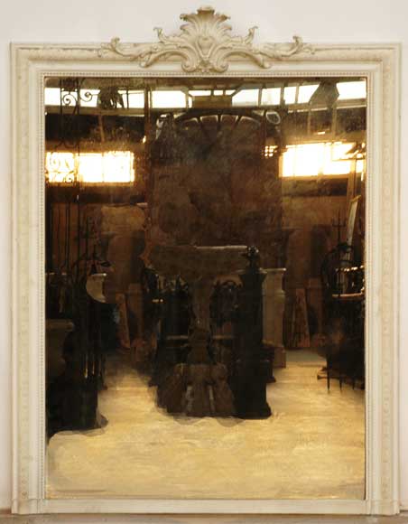 Wood_mantel_mirror_with_stucco_ornaments.jpg