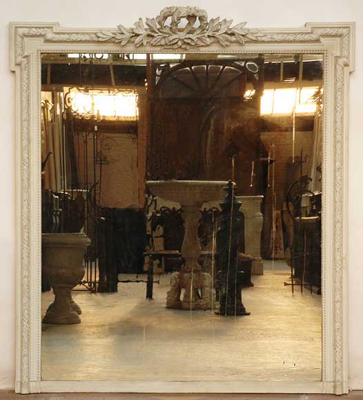 Stucco_and_wood_mantel_mirror.jpg