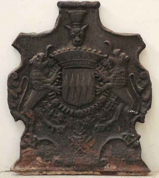 Cast_iron_fireback_with_lions.jpg