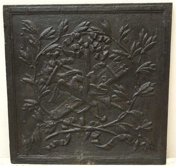 Cast_iron_fireback_with_hunting_trophy.jpg