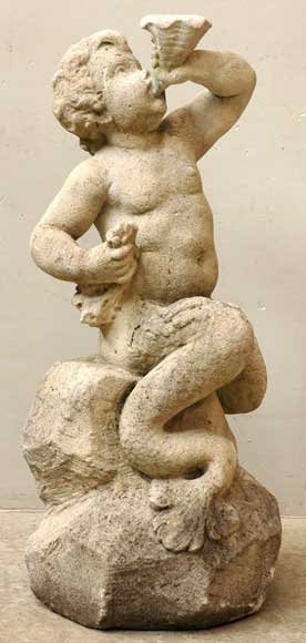 Stone_putto_fountain_center_piece.jpg