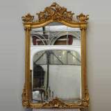Antique silver-glassed mirror in gilded frame