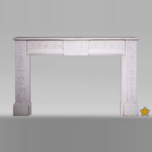 Carrara marble mantel with Vulcan's forge cartouche