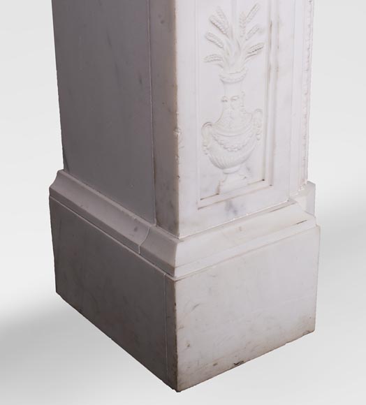 Carrara marble mantel with Vulcan's forge cartouche Carrara marble mantel with Vulcan's forge cartouche-8