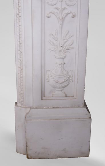 Carrara marble mantel with Vulcan's forge cartouche Carrara marble mantel with Vulcan's forge cartouche-11