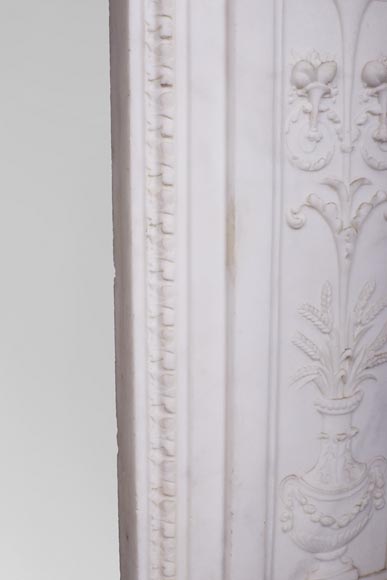 Carrara marble mantel with Vulcan's forge cartouche Carrara marble mantel with Vulcan's forge cartouche-12